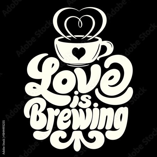 Cream colored coffee cup with heart and text love is brewing