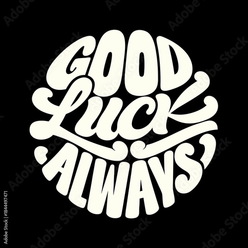 Creamy white text good luck always on black lettering