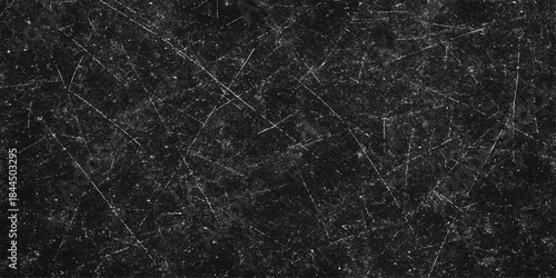 A vintage dark grunge texture with a rough black paper surface and natural leather pattern creates a textured material backdrop for a macro art wallpaper design