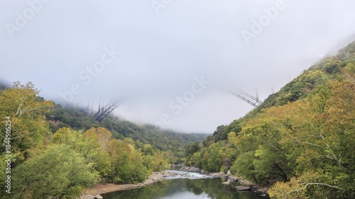 Time lapse of fog engulfing the New River Gorge Bridge then clearing as the sun rises shows a dramatic atmospheric condition common in the area.