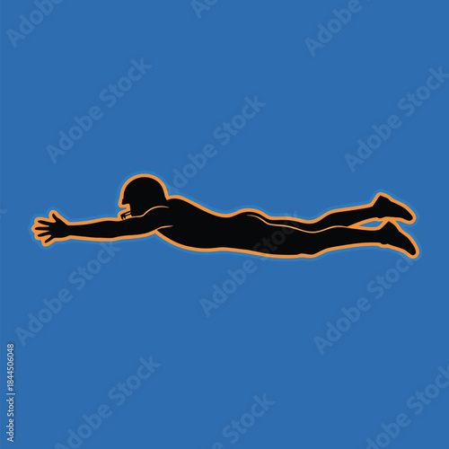 Silhouette of a football player diving forward.