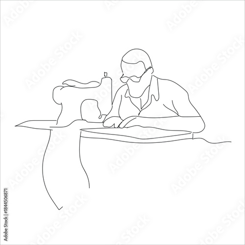 men's tailor. professional tailor working on old sewing machine. lien art