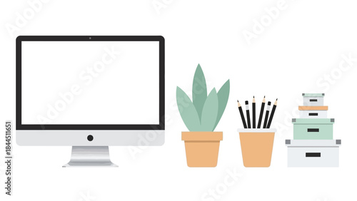 Minimalist computer workspace with plants and office supplies on white background