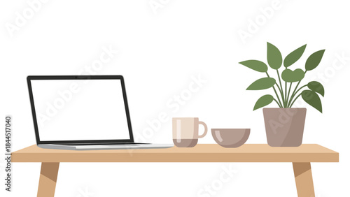 Minimalist workspace with laptop, coffee mug, and plant on wooden desk