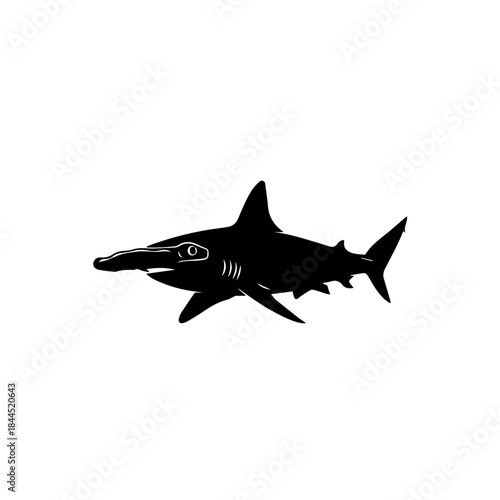 A black silhouette of a hammerhead shark swimming in profile, isolated on a white background.