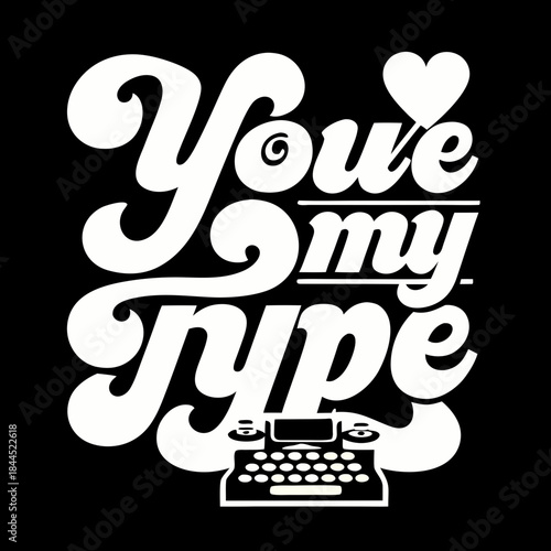 White typewriter and heart text on black background