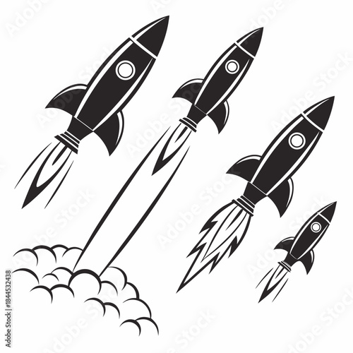 Black silhouette rockets launching with smoke trails