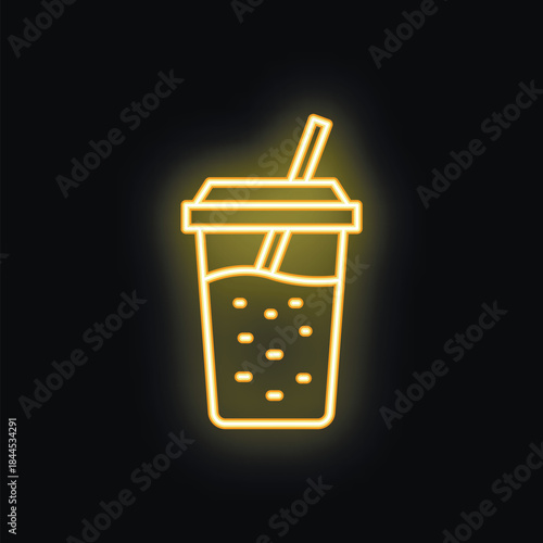 Bright yellow neon sign of a refreshing drink in a plastic cup with straw, glowing against a dark background