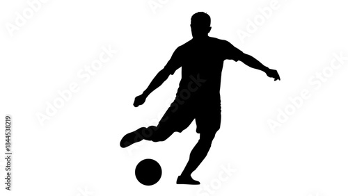 Shadow Striker: An artistic depiction of a soccer player, silhouetted against a simple backdrop, executes a powerful kick, symbolizing action, focus, and athleticism.