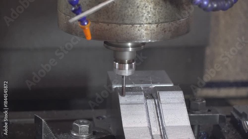 The CNC milling machine rough cutting the mold parts by flat nose end mill tools.