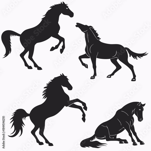 Four black horse silhouettes in various poses white background