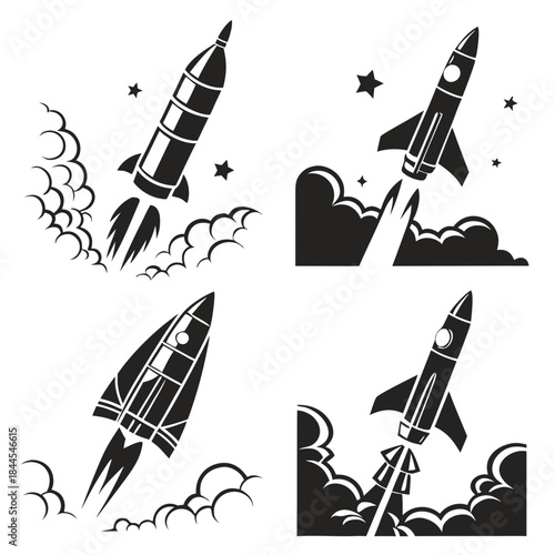 Four black silhouette rockets launching with smoke and stars