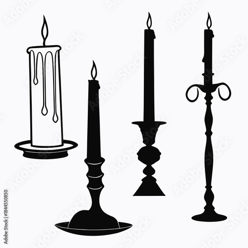 Set of five black silhouette candles with flames candlestick