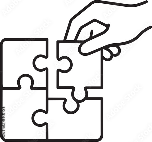 A hand carefully placing the final puzzle piece into an almost completed jigsaw puzzle outline