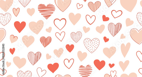Romantic seamless pattern overflowing with a charming variety of heart shapes, including outlines, solids, and textured designs, in delicate pink and red hues.