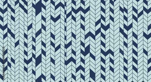 Stylish seamless pattern featuring an intricate knitted texture with alternating chevron and V-shapes in harmonious shades of light and dark blue.