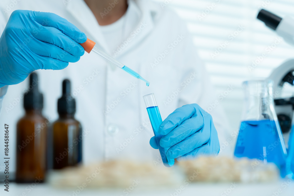 Fototapeta premium Scientist check chemical whole grains residues in laboratory. Control experts inspect the concentration of chemical residues. hazards, standard, prohibited substances, contaminate, Microbiologist