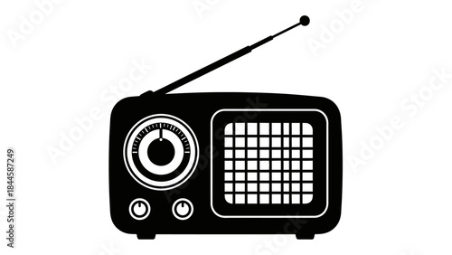 Retro black and white silhouette of a classic radio with an antenna and dial