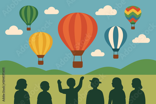 Diverse hot air balloons ascend into the sky above a silhouetted crowd enjoying a scenic landscape with rolling hills and fluffy clouds under a clear blue sky creating a festive atmosphere.