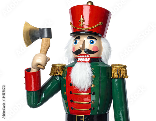 A close-up of a festive wooden figurine in a military uniform, holding an ax