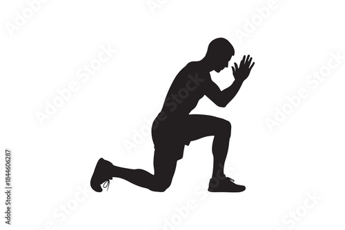 Silhouette Of Male Athlete Praying On One Knee