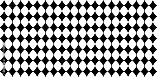Black and white diamond harlequin design forms a bold geometric pattern. Retro circus style seamless texture ideal for fabric, wallpaper, and carnival themed creative projects.