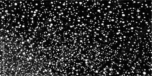 A grayscale image depicting a dense speckled pattern resembling snowfall