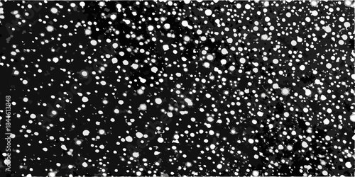 Abstract black and white speckled pattern with irregular shapes and high contrast