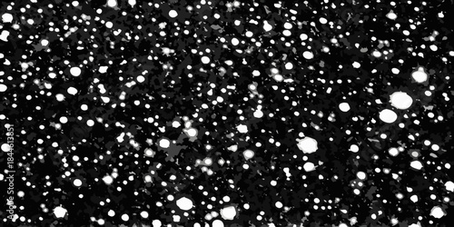 Abstract black and white speckled pattern resembling snowfall or static