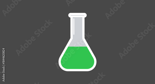 Green liquid in laboratory flask on dark background
