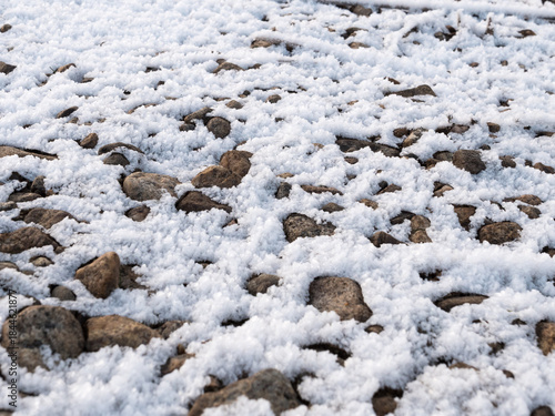 Frosty shore stones