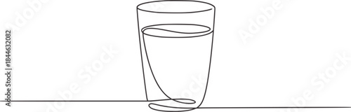 Minimalist continuous line of a half full glass water