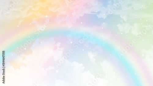 Clear pastel sky background, clouds with rainbow effect background. 