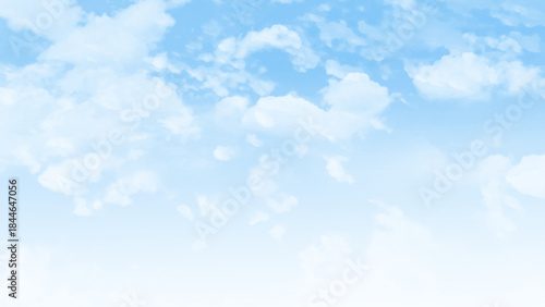 The sky is blue with a few clouds scattered throughout  photo