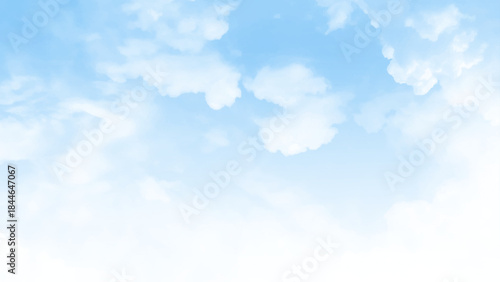 The sky is blue with a few clouds scattered throughout  photo