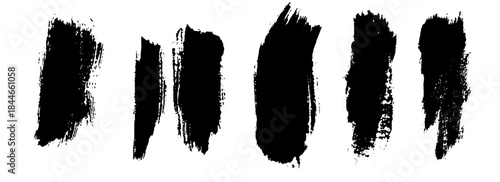 Collection of black paint brushstrokes, charcoal, liner and other strokes. Ink splashes, grunge blocks for text, banner. 