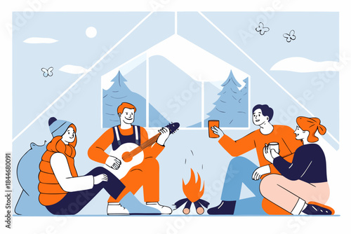 Friends gathered around a campfire playing music and enjoying each other s company