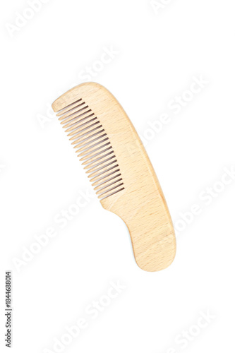 Wooden hair comb isolated on white background.