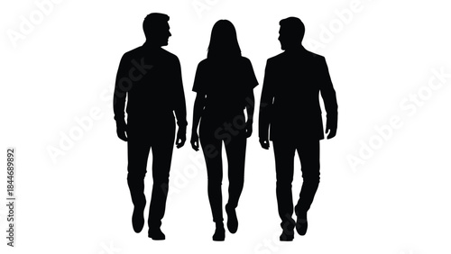 Three people walking together viewed from the front in a dark striking silhouette