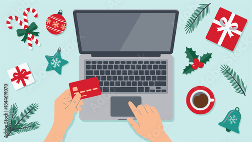 Christmas online shopping with laptop, credit card, and festive decorations