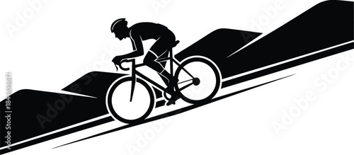 Silhouette cyclist riding uphill on a winding road