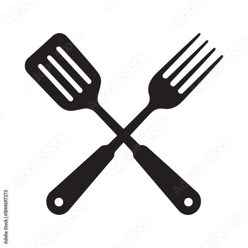 A simple black and white illustration depicts a crossed spatula and fork commonly used kitchen tools for cooking and serving food