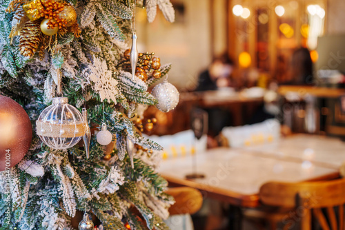 A Christmas tree at the restaurant and romantic evening decorations