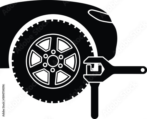 Car tire with wrench for wheel change, maintenance, and repair, symbolizing automotive service and technical support.
