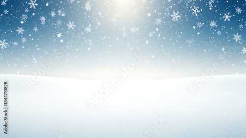 Winter landscape with snowflakes falling under a bright sky gradient of blue and white