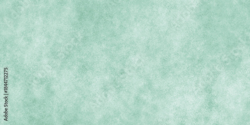 Abstract Elegant dark green background with mottled vintage texture in old fancy background design, texture of colored parchment paper.	