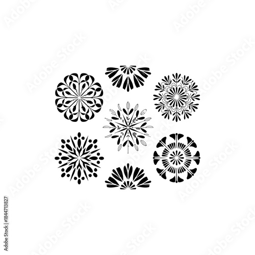 7 flower and leaf mandala designs, solid black vector fill