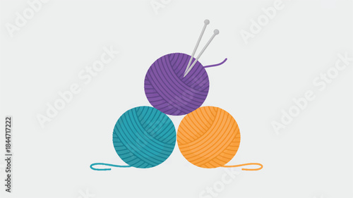 Colorful yarn balls with knitting needles