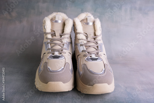 Winter sports shoes with warm lining inside. Women's winter sneakers