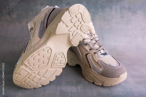 Winter sports shoes with warm lining inside. Women's winter sneakers